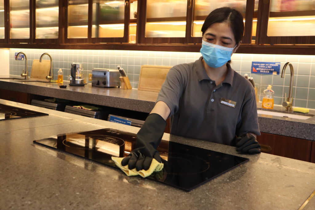 Magic Clean's staff is cleaning the kitchen at The Nate